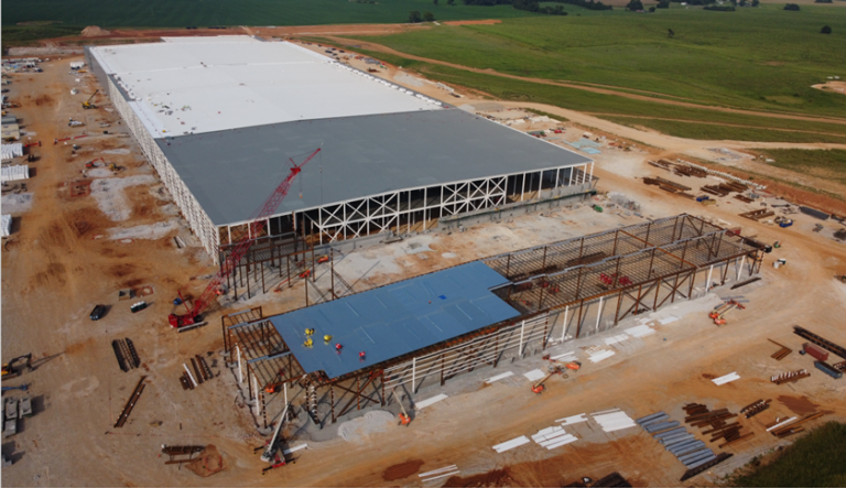 AESC | U.S. Locations | AESC Celebrates Structural Completion Milestone ...